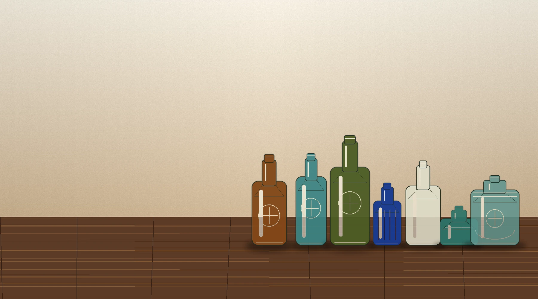 A collection of amber, aqua, cobalt, olive, and clear antique bottles on a wooden table